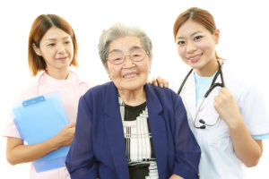Nurses and elderly woman